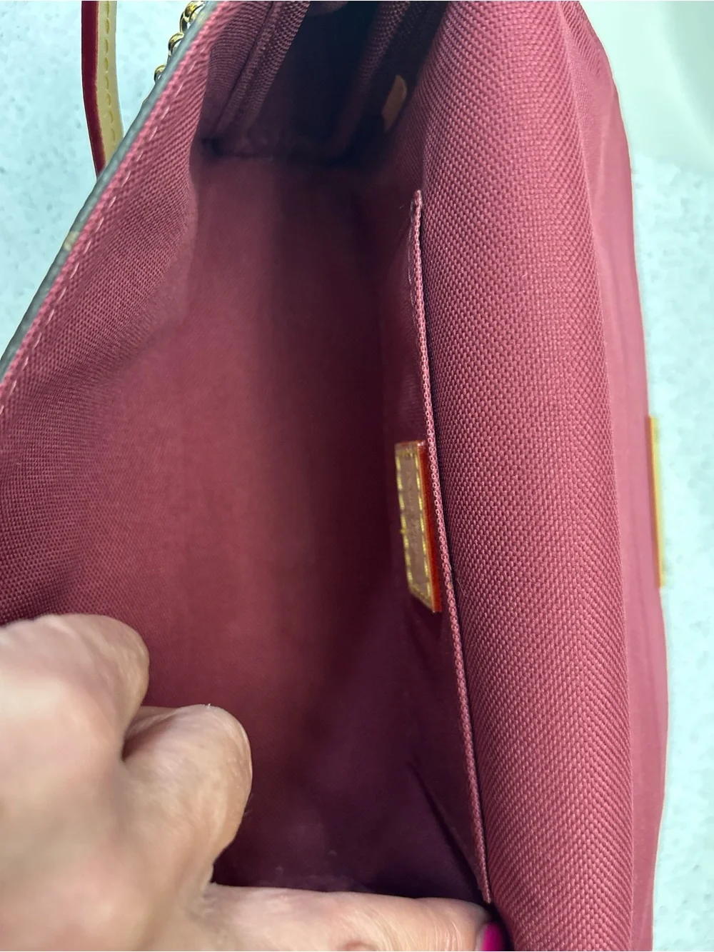 Louis Vuitton Monogram Canvas Clutch in Brown with Gold Accent